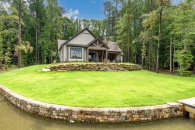 MINER'S COVE CUSTOM LUXURY WATERFRONT LAKEHOME! This custom- on Lake Winds Golf Course in Alabama - for sale on GolfHomes.com, golf home, golf lot